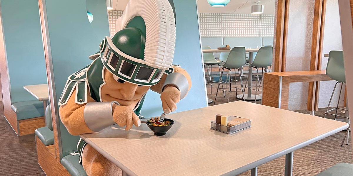 Sparty eating