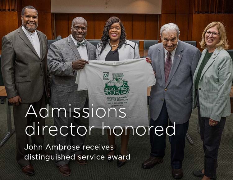 Admissions director honored: John Ambrose receives distinguished service award