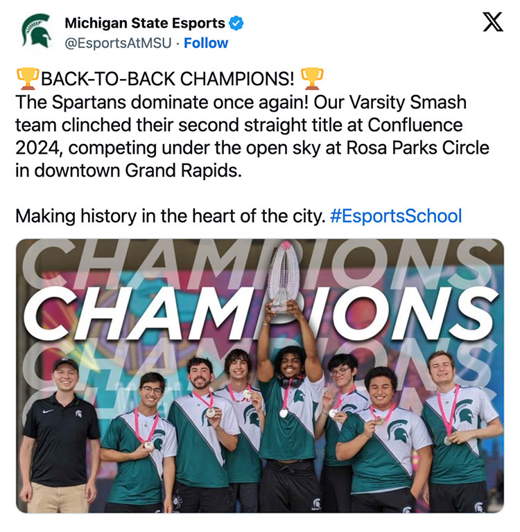 Michigan State Esports tweeted BACK-TO-BACK CHAMPIONS! The Spartans dominate once again! Our Varsity Smash team clinched their second straight title at Confluence 2024, competing under the open sky at Rosa Parks Circle in downtown Grand Rapids. Making history in the heart of the city. #EsportsSchool. There is a photo of the team that accompanies the text.