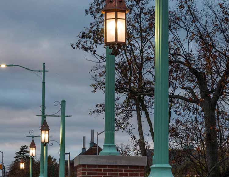 Vintage lampposts at sunset.